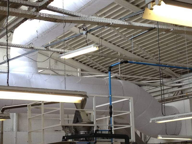 Soufflage par gaines textiles perforées des calories récupérées.